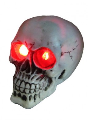 Бутафорский череп со светящимися глазами 15 см