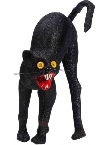 Черная кошка со сверкающими глазами